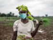 African-Woman-Farmer-with-mask