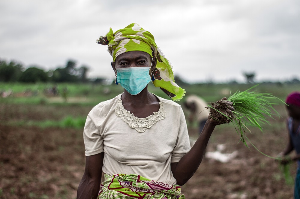 African-Woman-Farmer-with-mask